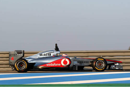 McLaren-MP4-26-Button-Test-2011-f498x333-F4F4F2-C-f44aa3b0-454742.jpg