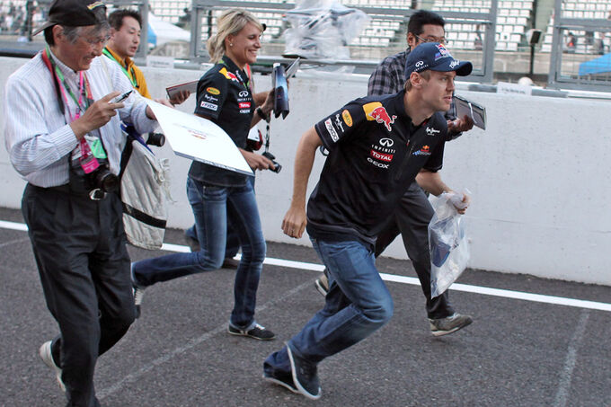 Sebastian-Vettel-GP-Japan-Suzuka-6-Oktober-2011-fotoshowImage-b38fc0d4-541802.jpg